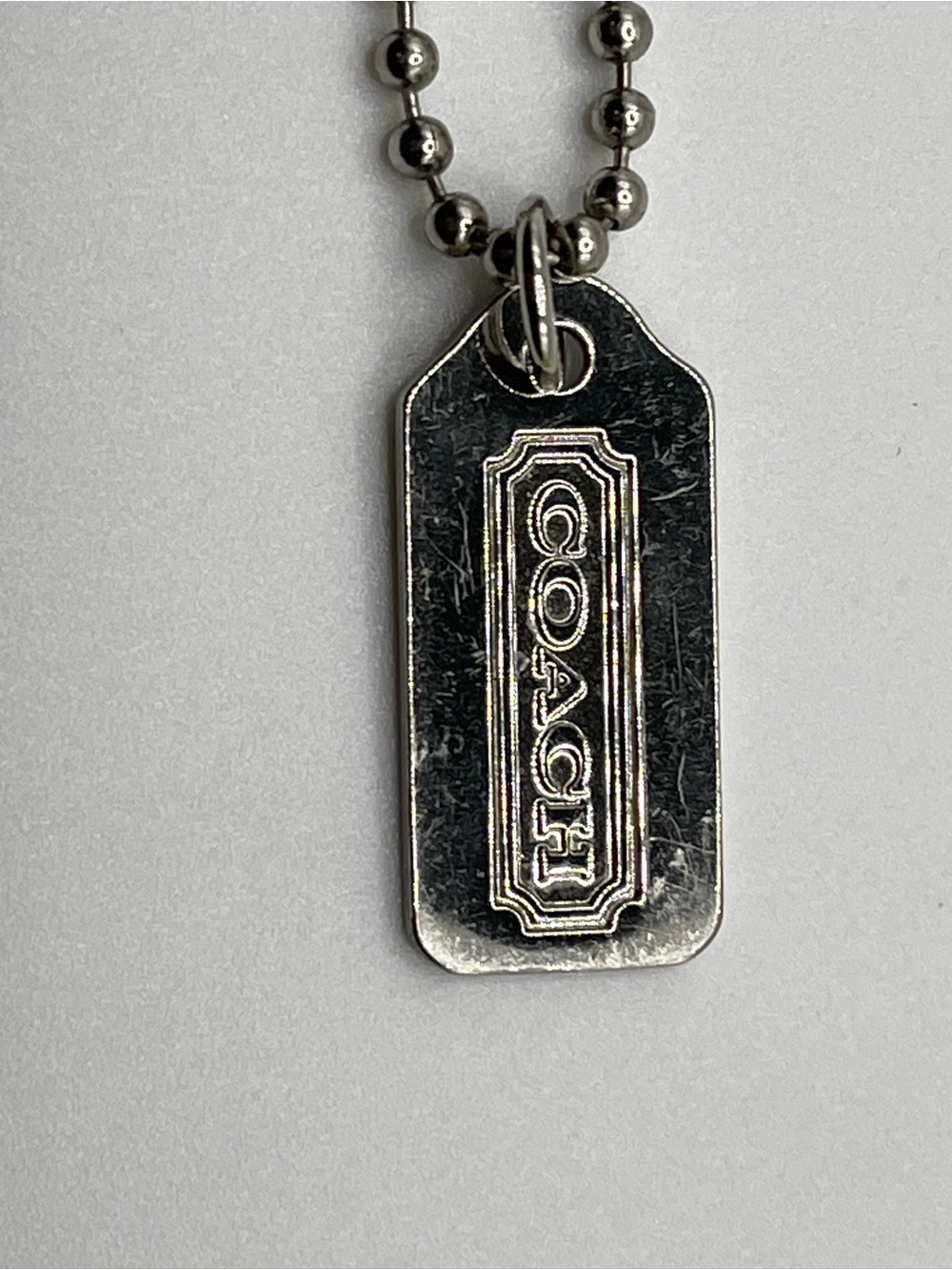 Coach Silver Metal Hang Tag